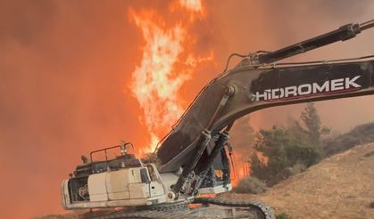 Alevlerin arasında kalan ekskavatörün operatörü ölümden döndü