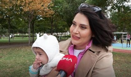 Meme kanserini yendi, anne oldu, bebeğiyle 'Pembe farkındalık yürüyüşüne' katıldı